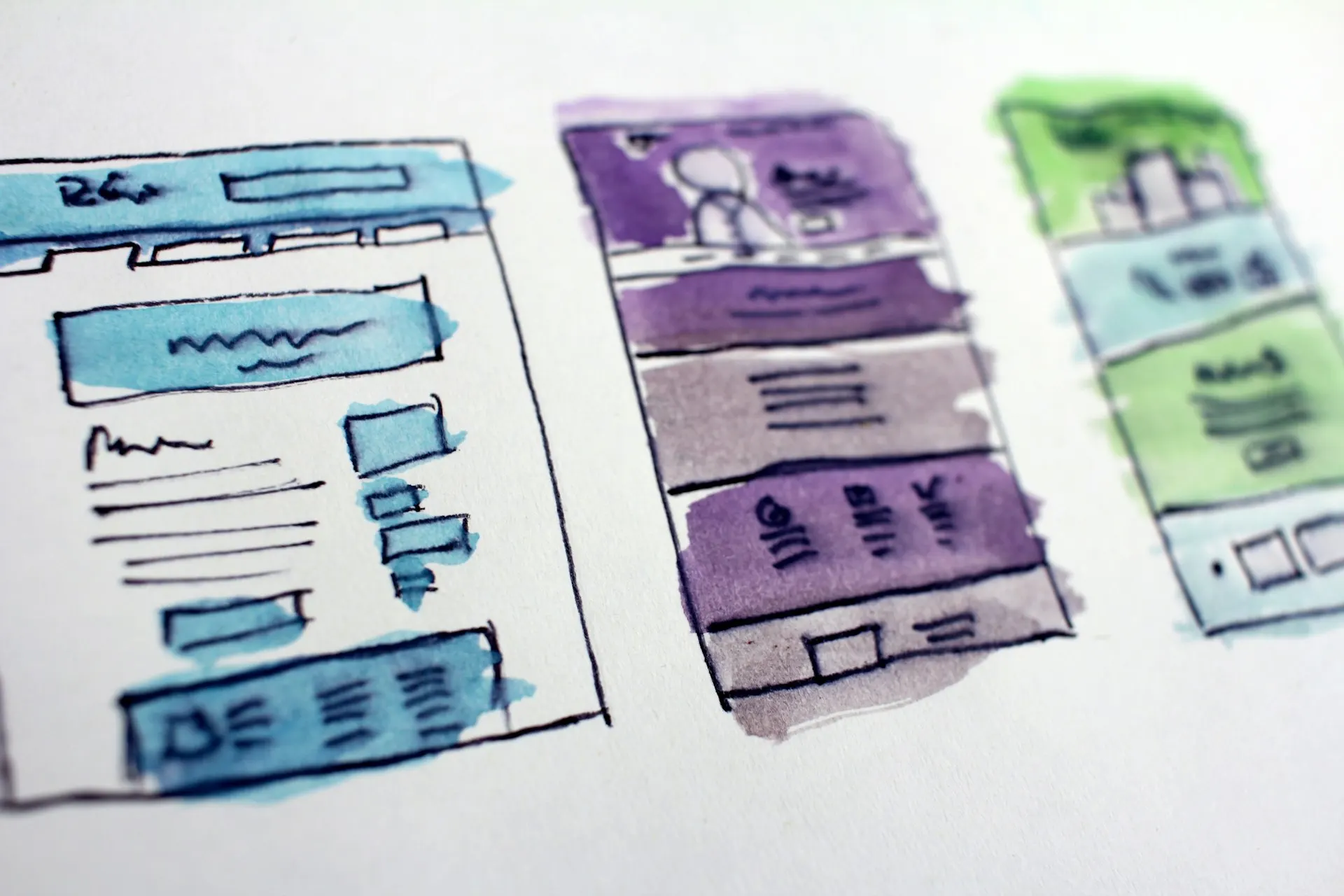 Designer reviewing a website interface layout, illustrative only